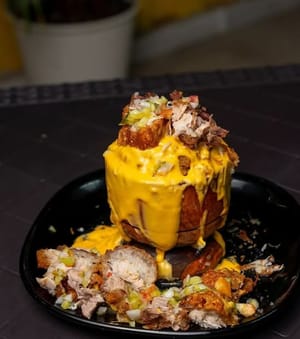 Mofongo de chicharrón y carnita
