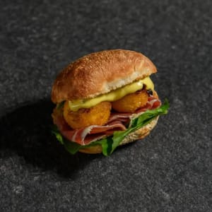 79. Jamon Serrano, Croquetas de Queso de Cabra, Honey Mustar, Miel Trufada, Rucula